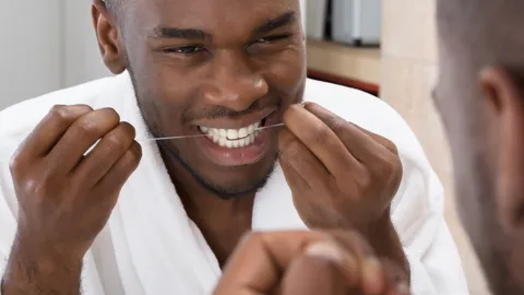 How to Floss Your Teeth (and What Happens if You Don't)