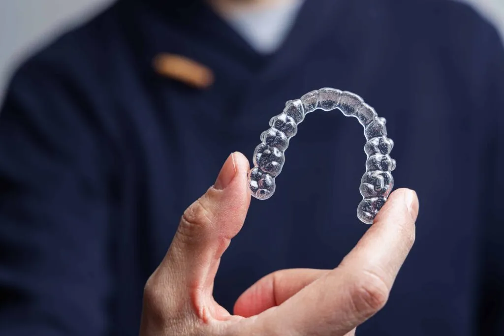 Invisalign held by doctor