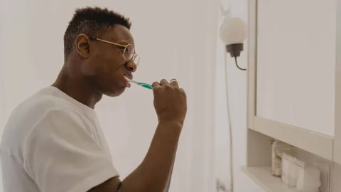 Should I Brush My Teeth Before or After Using Whitening Strips?