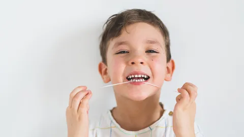 How to Safely Pull a Loose Tooth