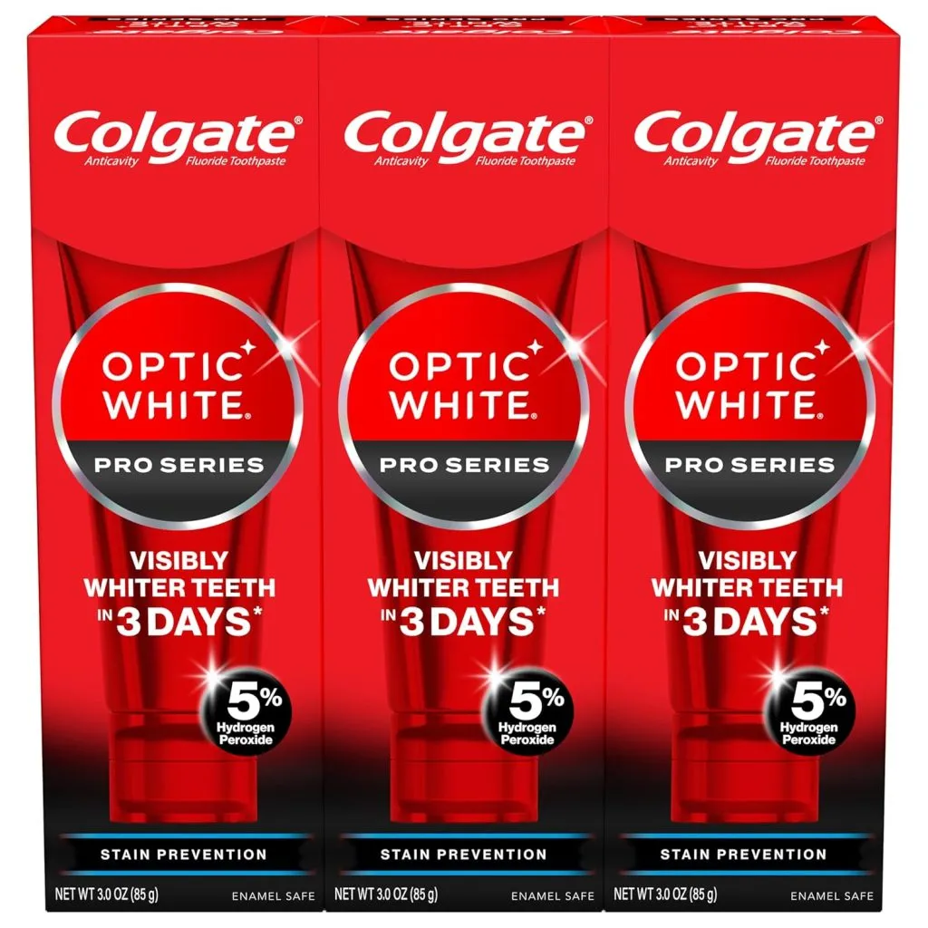 Three boxes of Colgate Optic White Pro Series toothpaste, each labeled for visibly whiter teeth in 3 days and containing 3 oz of product with 5% hydrogen peroxide.