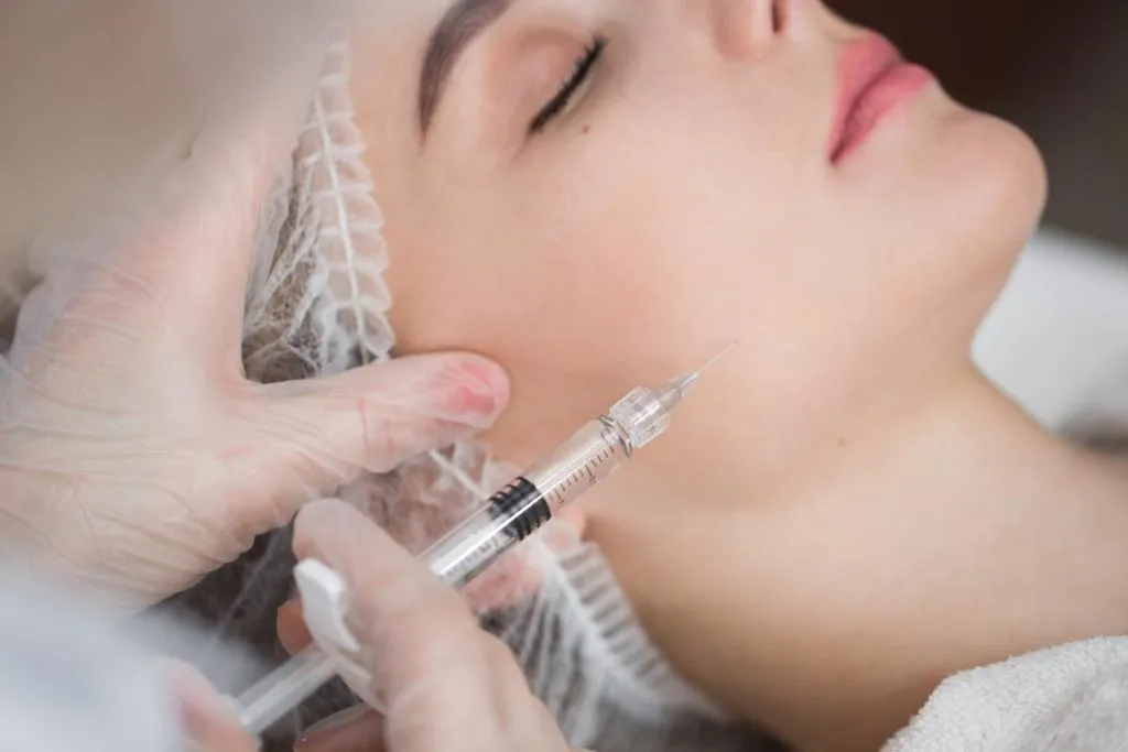 Cosmetic botox injection at cosmetology medical center.jpg