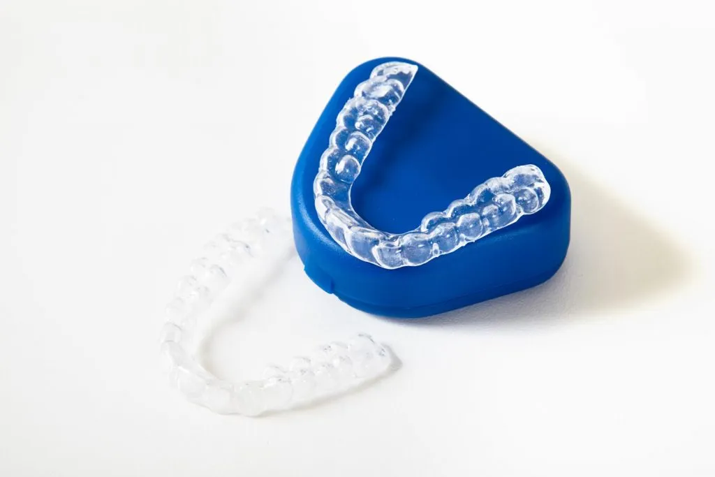 Two clear aligners with case