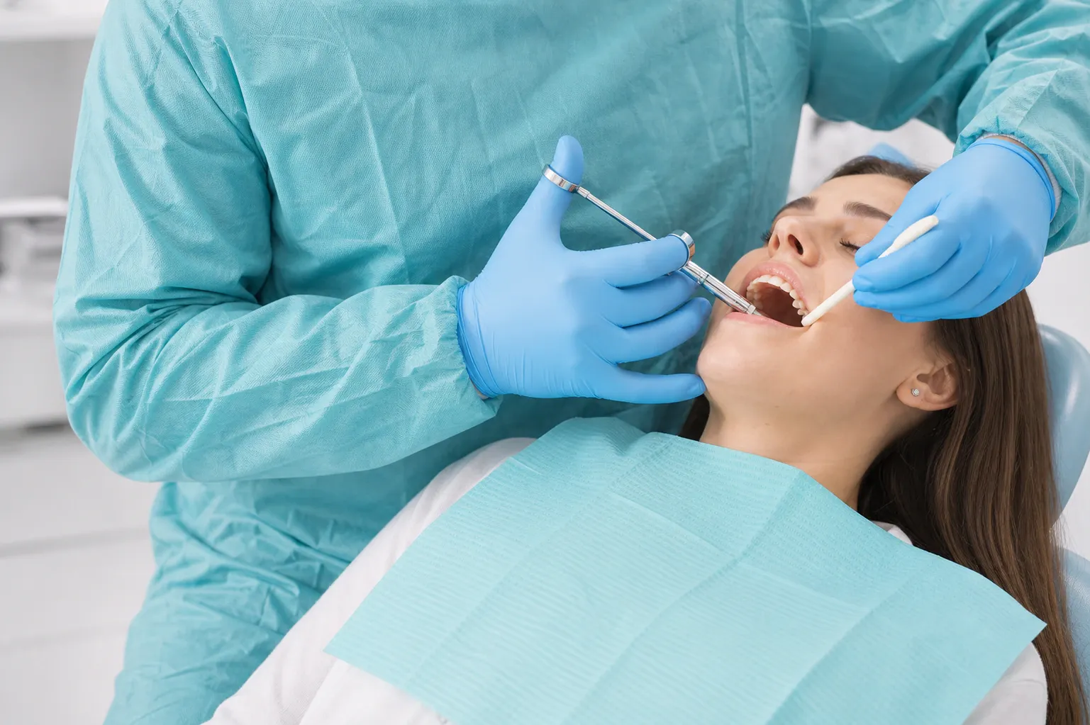 Woman receiving dental local anesthesia or sedation in dentist office nm 1369
