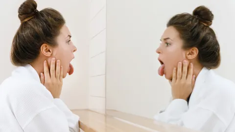 Yellow Tongue: Causes, Treatments, & When to See a Doctor