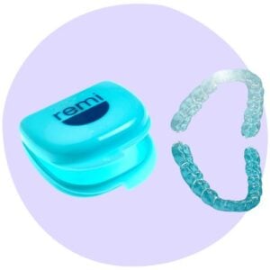 A turquoise Remi dental aligner case next to clear aligners on a lavender circular background.